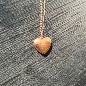 Tiffany & Co. I Love You heart-shaped locket.